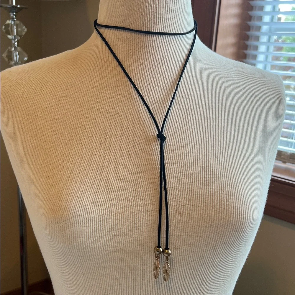Elegant Black and Gold Feather Pendant Necklace